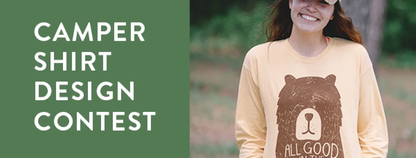 Smiling camp counselor wearing a funny shirt