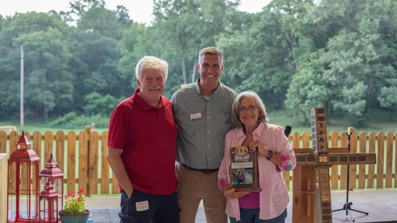 Camp sponsors with their donation